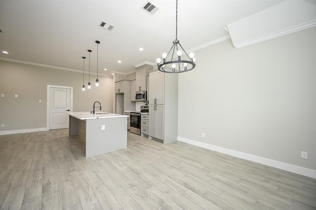 Dining Room Connected To The Island Kitchen & Family Living Room | Image 21
