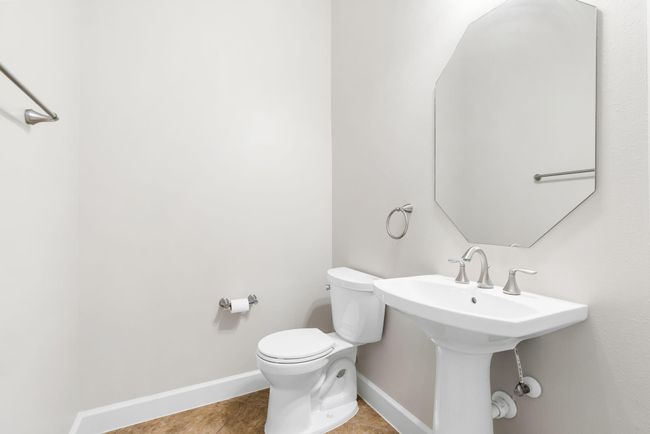 Half bath downstairs next to office. | Image 33