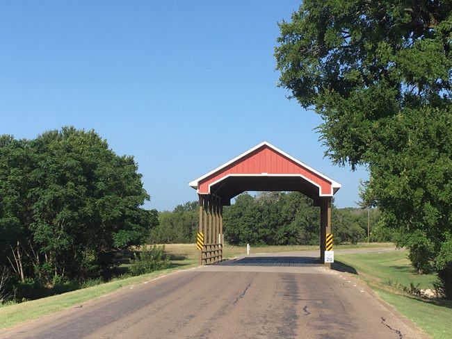 The red covered bridge welcomes all to White Bluff Resort! | Image 5