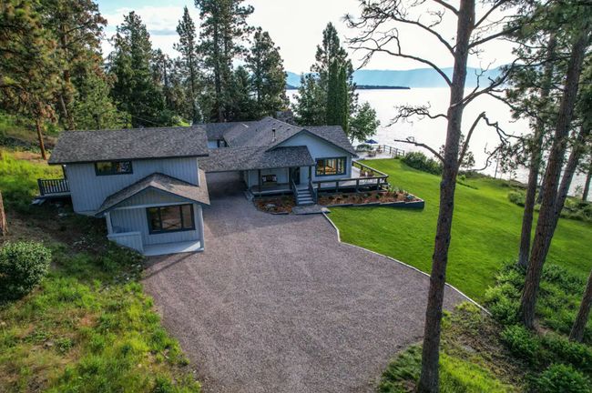View of front of house with a front yard and a deck | Image 9
