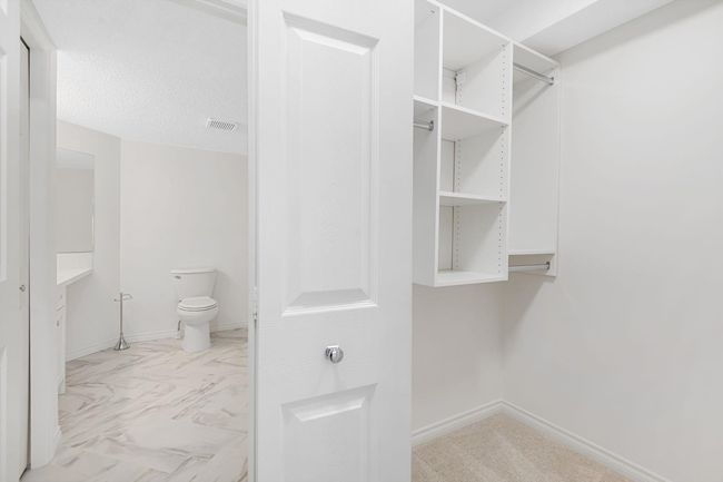 2205 - 7451 Springbank Blvd Sw, Condo with 2 bedrooms, 2 bathrooms and 1 parking in Calgary AB | Image 34