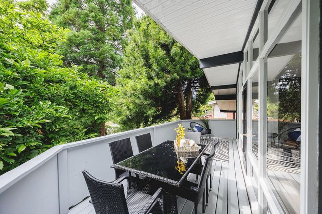 Wooden terrace with outdoor dining area | Image 21