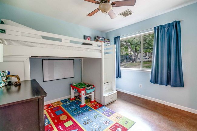 Bedroom featuring visible vents, a ceiling fan, and baseboards | Image 12