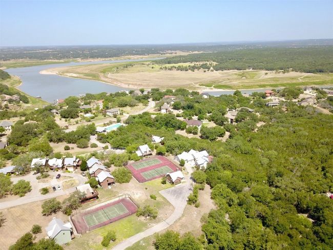 Another aerial view of 113 Courtside Way and the community of Ridge Harbor. | Image 25