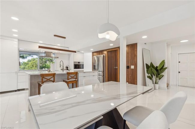 Dining room and kitchen | Image 4