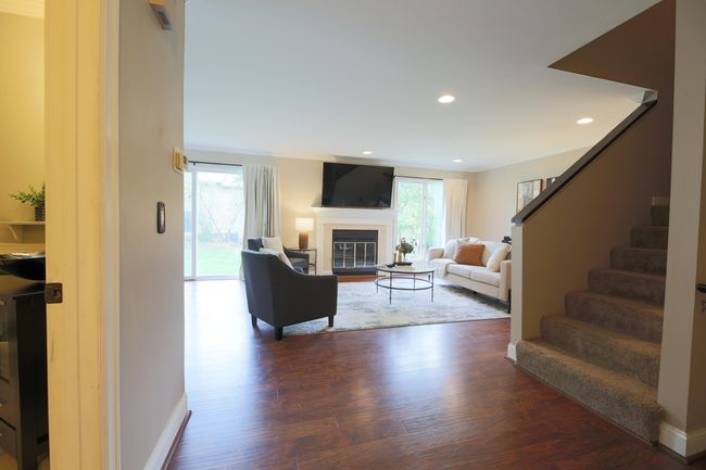 Open concept Townhouse with wide staircase, high ceilings, modern powder room and tons of space! | Image 4