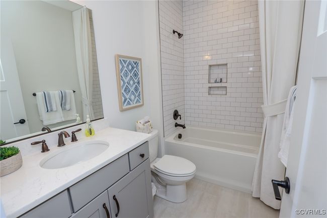 The second floor features a loft, an additional bedroom with walk-in closet and a full bath with tub/shower combo. | Image 24
