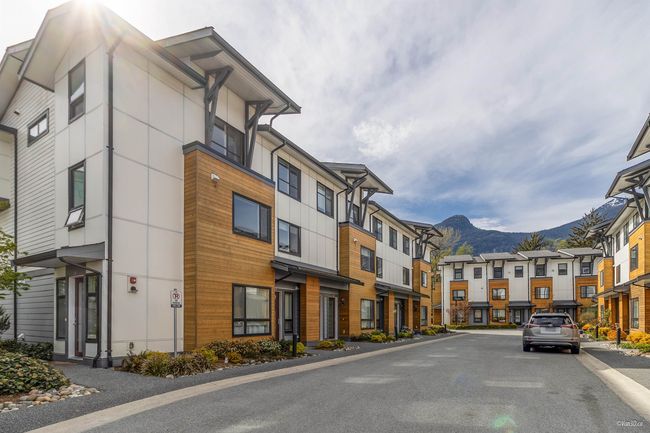 View of road with curbs, a mountain view, and a residential view | Image 16