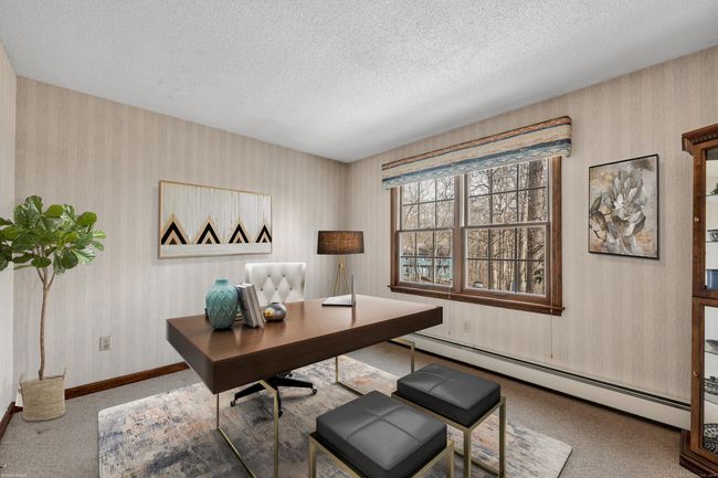This room off family room hall on main level could be office or guest room | Image 19