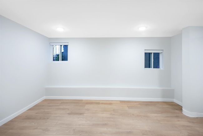 Spare room with recessed lighting, light wood-type flooring, and baseboards | Image 7