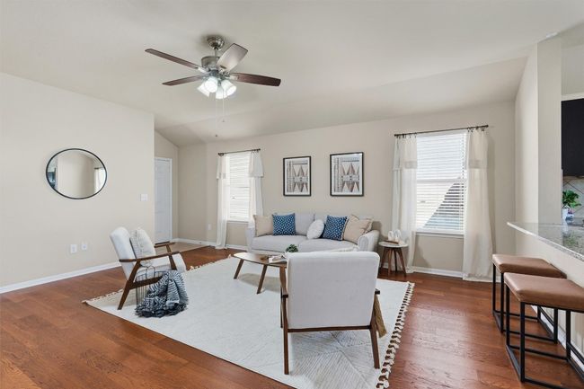 Stunning hardwood floors anchor the home. | Image 5