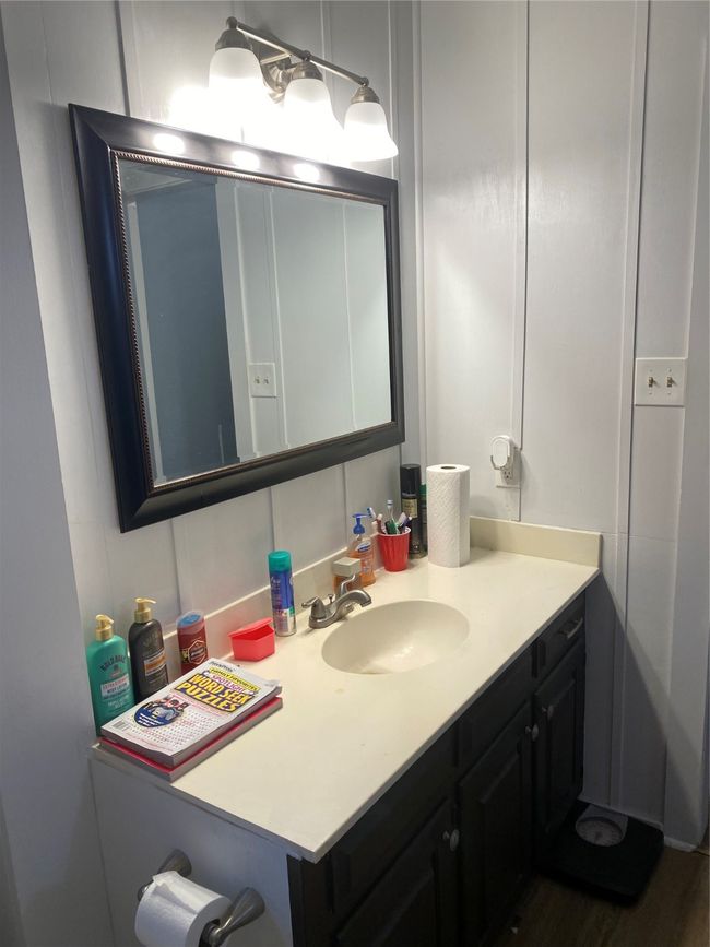 Bathroom featuring vanity | Image 8