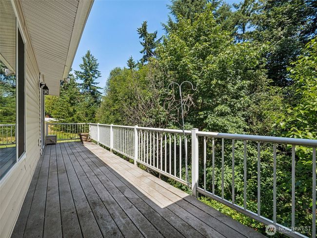South facing deck offers beautiful sunny mornings and shade in the evening when you need to cool down... | Image 15