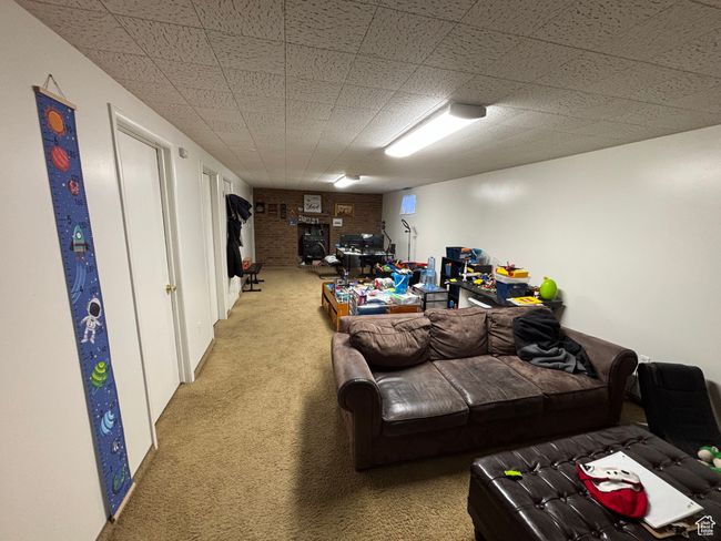 Living area with carpet flooring | Image 17