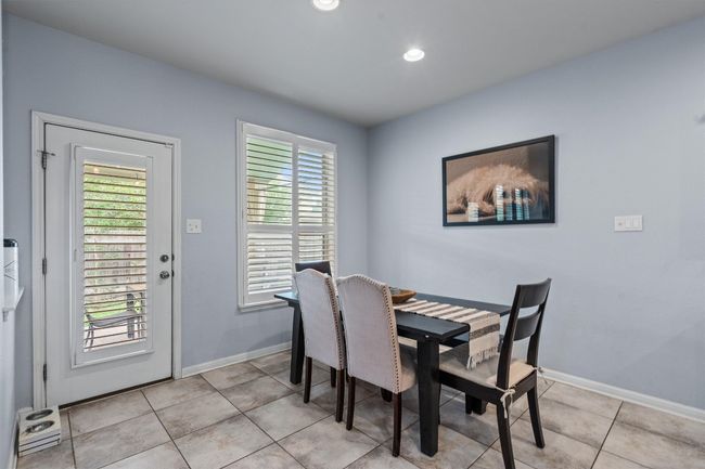 Tiled dining room with baseboards and recessed lighting | Image 13
