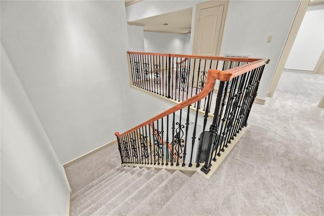 Recently installed carpet - let's go back down & check out the guest quarters. | Image 34