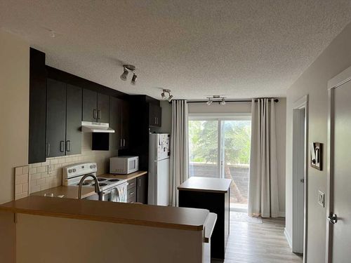 303-2445 Kingsland Rd Se, Airdrie, AB, T4A0B4 | Card Image