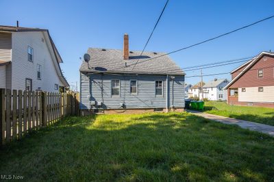 Rear view of property with a yard | Image 2