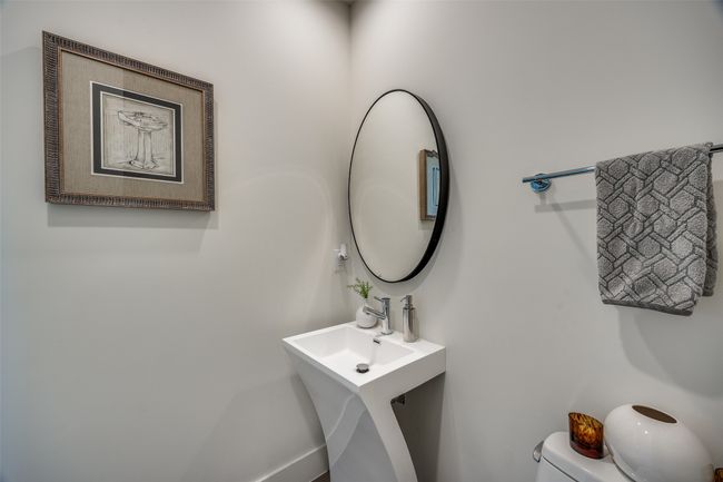 Half bathroom featuring toilet | Image 31