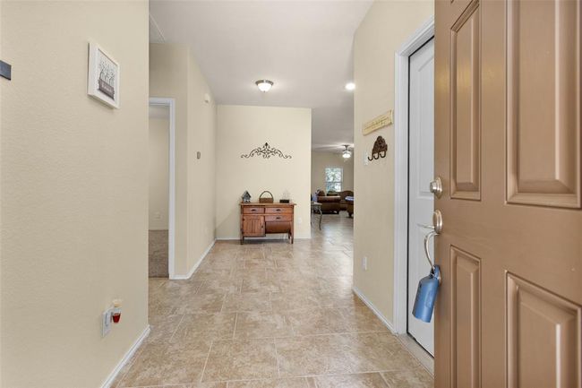 Entryway with garage access to your right. | Image 9