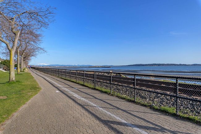 View of water feature with a view of the beach | Image 35