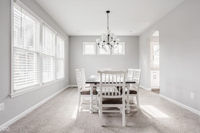 Dining room is connected to the Butler's Pantry and the kitchen. | Image 21