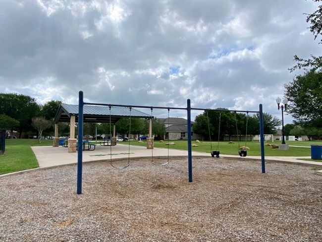 Community playground with a yard and a gazebo | Image 6
