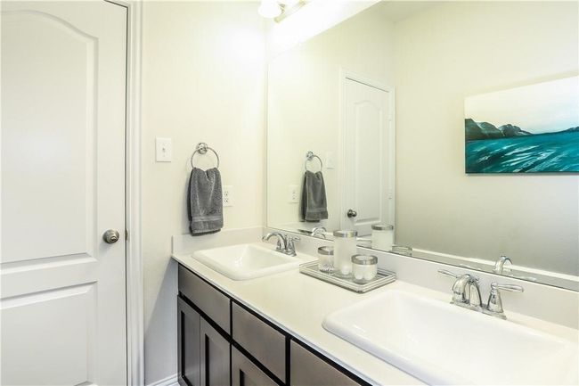 Bathroom featuring double vanity | Image 27