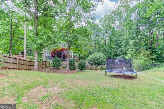 1180 Windridge Dr, House other with 4 bedrooms, 4 bathrooms and 2 parking in Loganville GA | Image 49