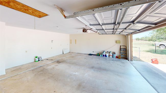Garage featuring a garage door opener | Image 19