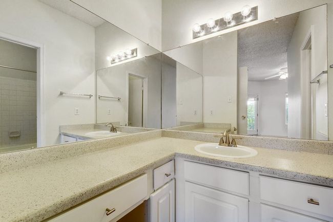 Spacious vanity area in master bathroom. | Image 16