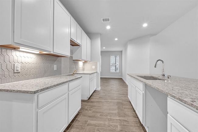 This photo is for illustrative purposes only and is not to be considered an exact replica of the finished home. Rendering does not match the finished product in terms of features, colors, landscaping, etc. Pricing, specifications, square footage and materials are subject to change at any time and without notice. | Image 4