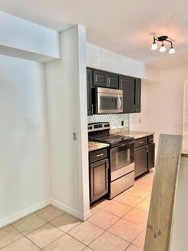 UNIT-1101 - 9481 Highland Oak Dr, Condo with 3 bedrooms, 2 bathrooms and null parking in TAMPA FL | Image 11