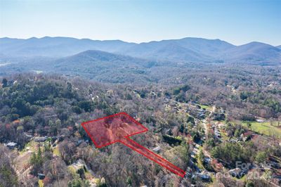 This land and home are in close distance to the VA hospital and all that east Asheville has to offer. With land size, potential exists to further subdivide, buyers agent to verify. | Image 2