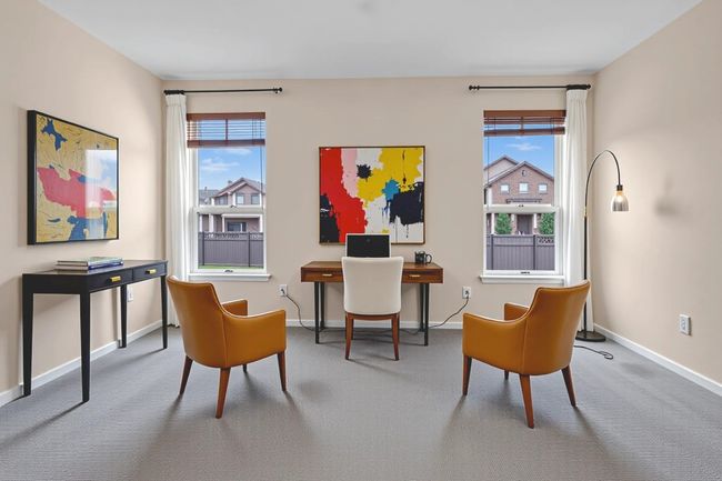 *virtual staged Office *featuring flooring, plenty of natural light, and baseboards | Image 17
