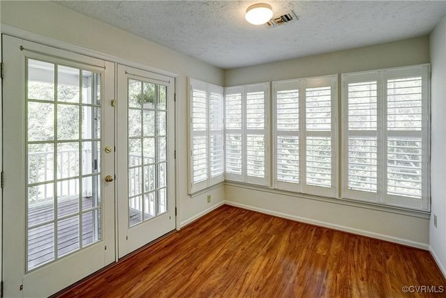 Great for Morning Room/Eat-In Kitchen/Office - Lots of Possibilities! Beautiful Plantation Shutters, French Doors to Balcony! | Image 15