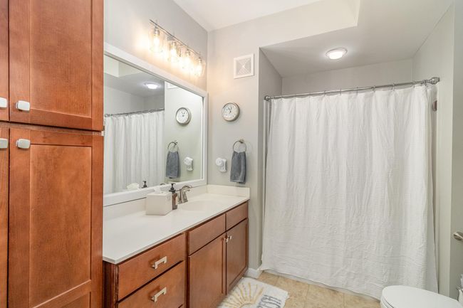 Private primary bath has two large linen closets and a walk in shower. | Image 15