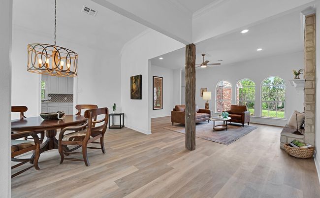 Open Dining space with elevated modern chandelier | Image 6