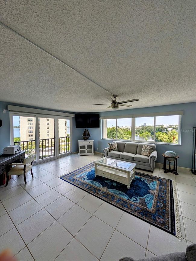 The beautifully updated kitchen opens to the family room with new sliding doors. There is a walk in Pantry and the walk in laundry room. | Image 12