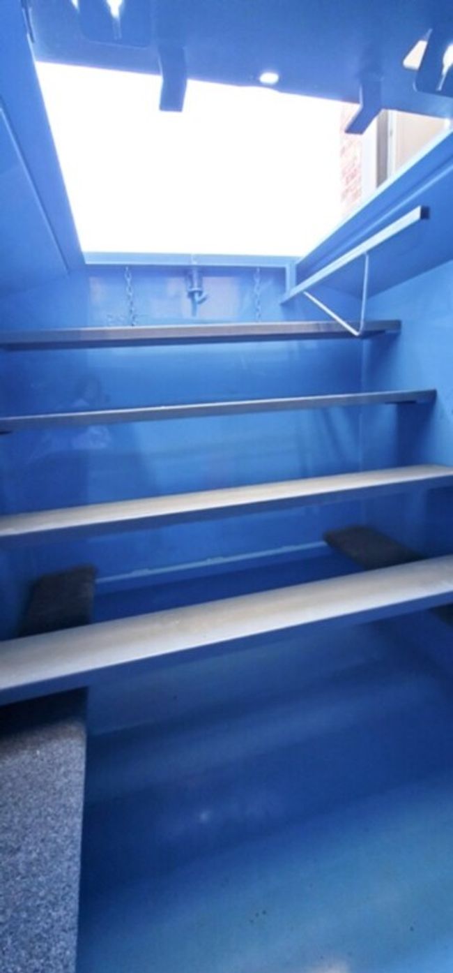 Inside storm shelter looking up the steps. | Image 39