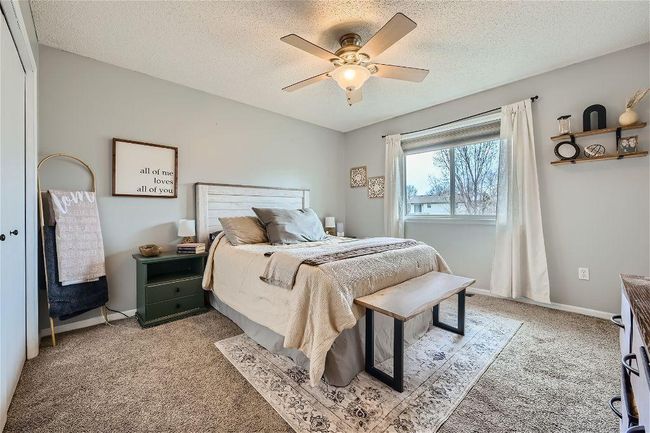 Neutral-toned primary bedroom! | Image 12