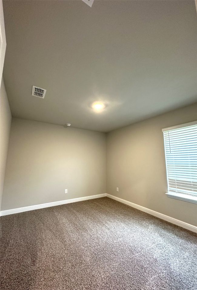 Carpeted empty room with baseboards | Image 19
