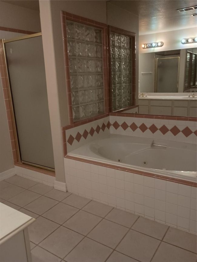 Primary Bathroom with separate shower and bathtub | Image 11