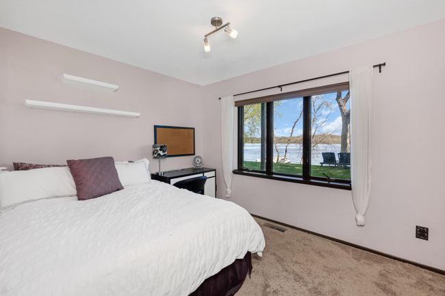 lower level bedroom: river view | Image 20