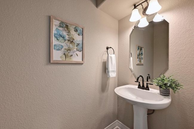 View of downstairs half bath | Image 16