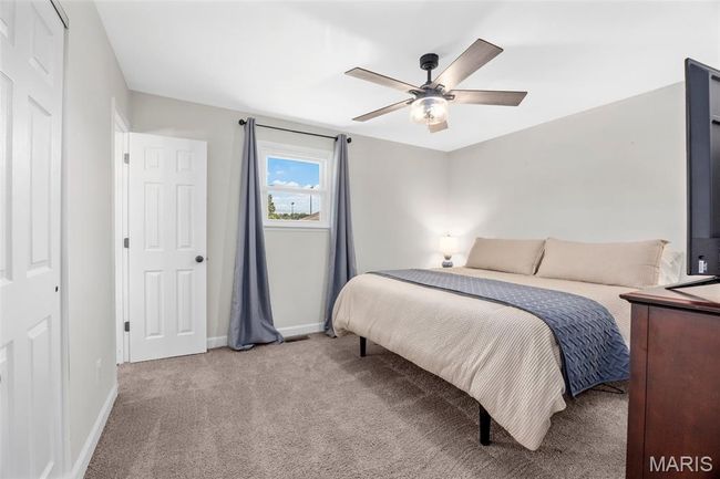 Bedroom featuring carpet and ceiling fan | Image 18
