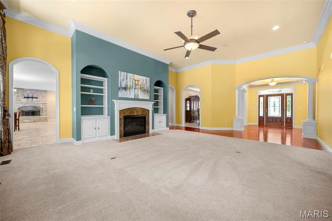 Great Room with soaring 12 ft ceilings! Gas Fireplace (1 of 2) | Image 4