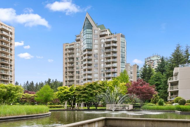 View of apartment building / complex with a water view | Image 16