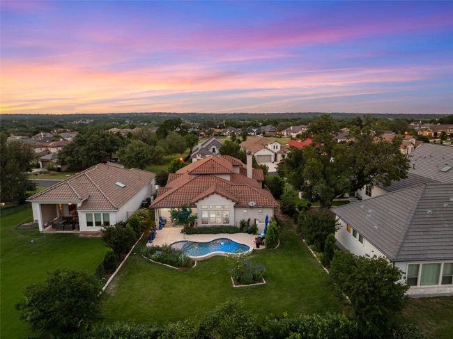 Bird's eye view with a residential view at dusk. | Image 38