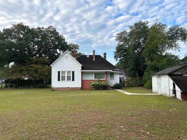 View of front facade featuring a front lawn | Image 13
